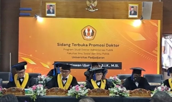 Raih Doktor,  Kombes Pol Yade Setiawan Ujung Angkat Keberhasilan Operasi Aman Nusa II Tangani Covid-19