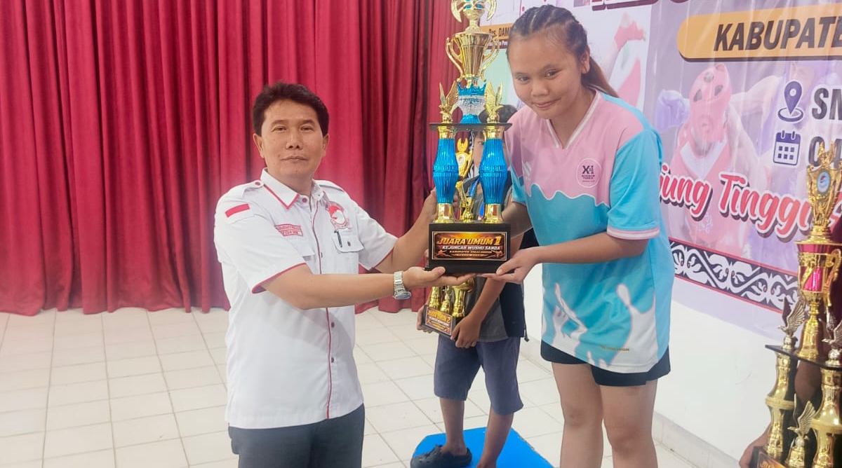 Sasana wushu SMAN 1 Plus Raya Juara 1 Kejurcab Wushu Sanda Simalungun